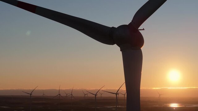 Wind turbines generating power, wind farm, aerial view