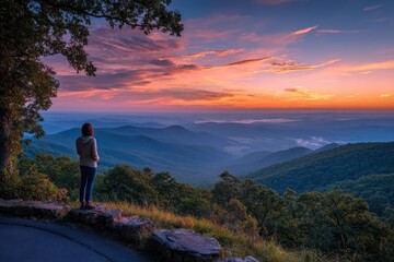 Obraz premium Sunset over the Blue Ridge from Skyline Drive: Woman at a Shenandoah overlook, Virginia