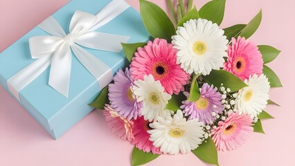 Fototapeta premium Beautiful bouquet of flowers and gift box on pink background for special occasions