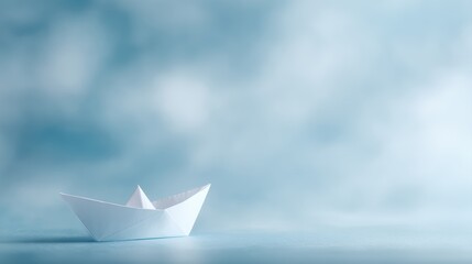 paper boat dreaming of vast skies, simple origami boat floating against clear blue background, ambition freedom and new beginnings concept