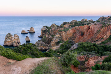 Cliff and rock formations near Praia dos Pinheiros, one of the beaches of Lagos in the Algarve (Portugal)