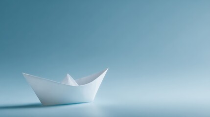 paper boat dreaming of vast skies, simple origami boat floating against clear blue background, ambition freedom and new beginnings concept