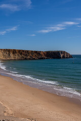 Scenic View Of Prainha das Po&ccedil;as beach and cliffs which is located in Sagres, Algarve Region of Portugal against Cloudy Sky. Located at the southwestern tip of mainland Europe.