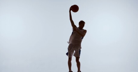 Basketball athlete preparing controlled overhead shot in elevated position. Concept of shooting mechanics, digital coaching tools, movement breakdown, and technique refinement. - Powered by Adobe