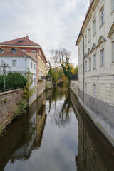 Fototapeta premium Buildings along a canal, Kampa Island, Prague, Czech Republic