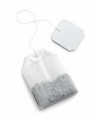 Tea bag with blank tag on white background