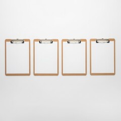 Four clipboards arranged in a row, isolated on white background