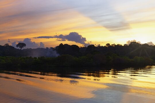 Sunset on the Madeira River, an Amazon tributary, Amazonas state, Brazil