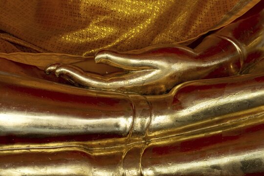 Gilded Buddha statue, Bhumispara-mudra, Buddha Gautama at the moment of enlightenment, Wat Pho, Bangkok, Thailand