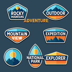 Collection of colorful badges featuring mountain and outdoor adventure themes