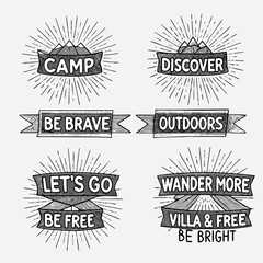 Vintage camping and adventure badges with inspirational quotes and sunbursts