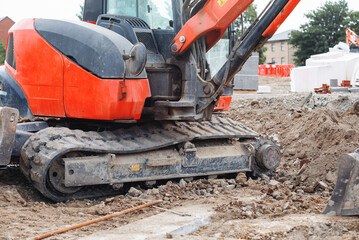 Excavator lost broken track and awaiting for repair