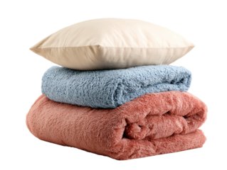 Stack of fluffy home textiles including pillow and blankets