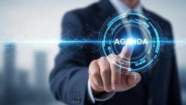 Businessman interacting with a futuristic virtual interface displaying the word 'Agenda' for meeting planning and business management. - Powered by Adobe