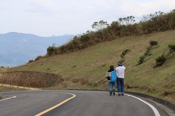 Walk on the road in the middle of the mountains