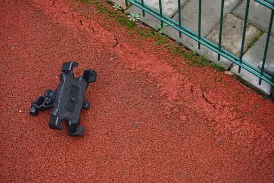 Plastic phone holder - Powered by Adobe