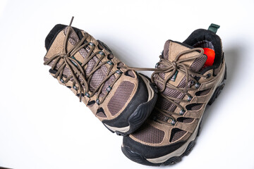 Sturdy brown sports footwear designed for rugged mountain adventures and professional outdoor photography