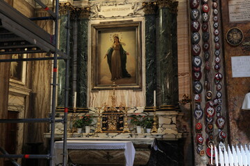 Chapel at Sant'Andrea delle Fratte Basilica with Votive Hearts and Scaffolding in Rome, Italy