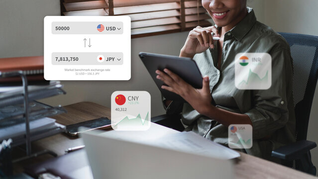 African American adult woman digital tablet analyzing global currency exchange data financial market insights managing international business transactions remote home office - Powered by Adobe