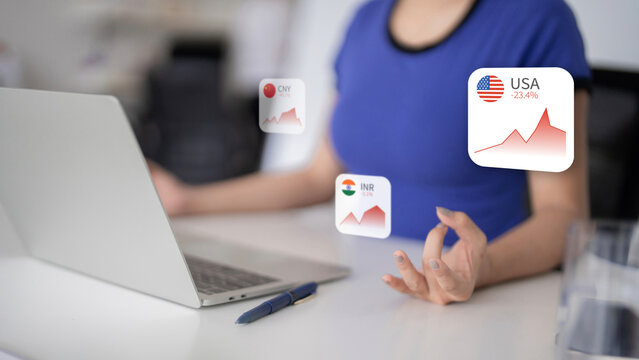 Adult professional analyzes global financial market trends laptop virtual data display augmented reality investment management - Powered by Adobe