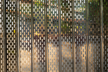 Stainless steel and aluminum light blur background. Stainless steel and aluminum light blur background. Metal texture background. Slotted Hole Perforated Metal Sheet .