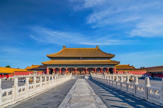 A stunning view of the Qianqing Palace in the Forbidden City, Beijing. Capturing traditional Chinese architecture with vibrant roofs and intricate details under a clear sky. - Powered by Adobe
