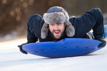 Dad Takes Turn Sledding