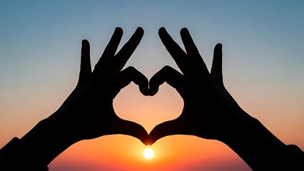 Hands Forming Heart at Sunset