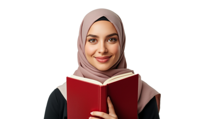 A smiling young woman wearing a hijab holding a red book on