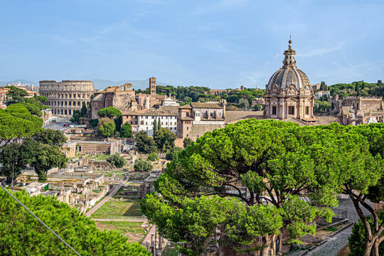 A wide view of the Imperial Forum and the Colosseum in Rome
