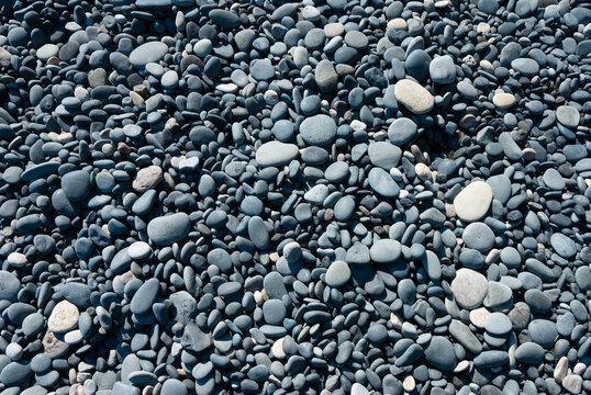 Small pebbles on the shore of Iceland - Powered by Adobe