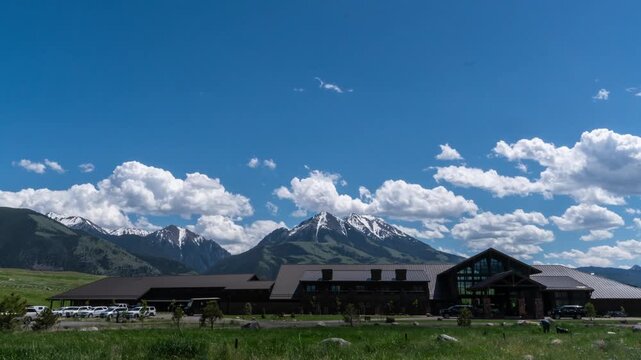 Clouds over Mountain peak and luxury resort 