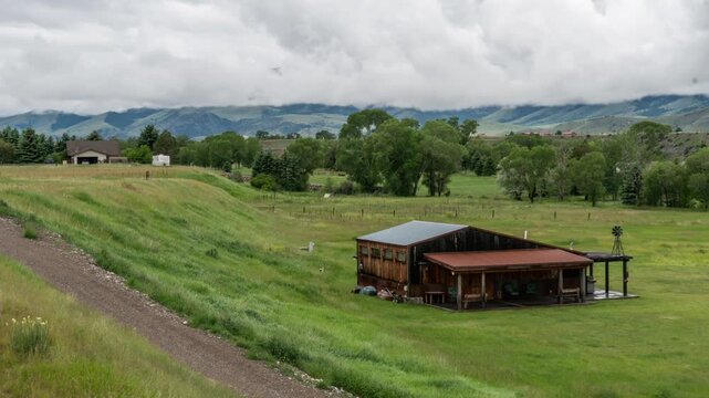 Thick turbulent clouds barn field 