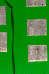 the printed circuit board for computer operation, part and close-up of the board of computer elements to ensure its operation