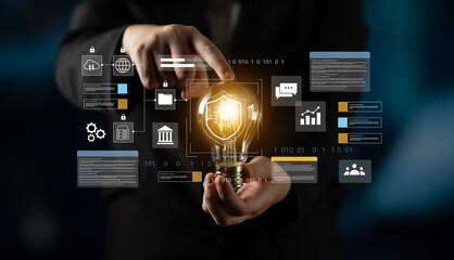 A businessman holds a light bulb, symbolizing innovation and creativity, with various digital icons representing security, data analysis, and finance trends. Gantry
