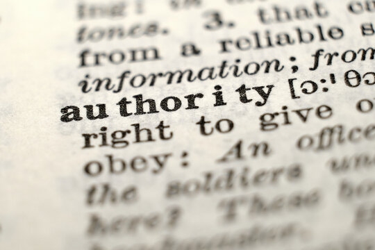 Macro dictionary photo of &ldquo;authority&rdquo;, concept for leadership, power, institutions and governance.