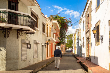Man in Panama hat walking the street in Zona Colonial of Santo Domingo