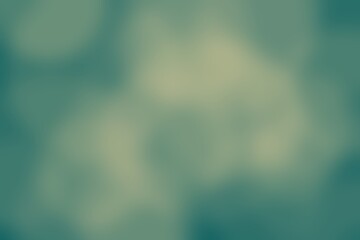 Soft blurred abstract background with teal and light green hues creating a serene visual