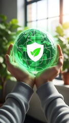 Hands holding a glowing green globe with a shield and leaf symbolizing environmental protection and sustainability efforts