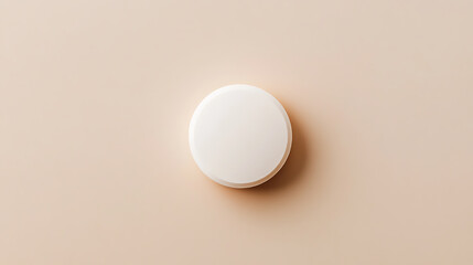 An overhead shot showcases a pristine, white circular object against a soft, pastel backdrop, creating a serene and minimalist composition with subtle shadows and clean lines.