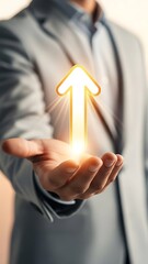 A businessman presenting a glowing upward arrow symbolizing growth and positive direction