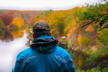 man in autumn forest