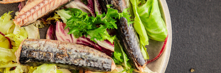 Mackerel salad canned fish, lettuce leaves tasty snack fresh delicious gourmet food table setting...