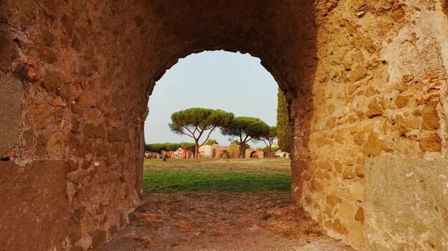 The sun sets on the Park of the Aqueducts or Parco degli Acquedotti in Rome, Italy