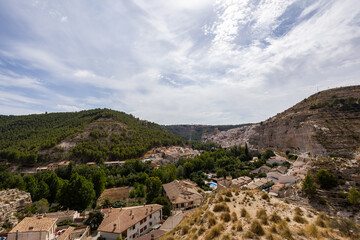 Alcala del Jucar village built into cliff in Spain