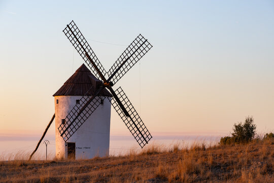 Traditional Spanish windmill in Mota del Cuervo at sunset