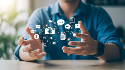 Man interacting with digital icons representing technology and communication