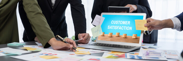 Analyst team use sticky note for creative and analytic brainstorm for business idea with BI data dashboard on laptop screen. Analysis financial data visualization tech for marketing strategy. Prodigy