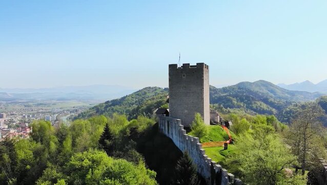 Aerial view of Celje Castle tower and surrounding forest, Slovenia