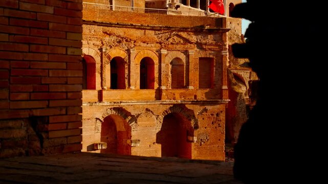 Dramatic view of the House of the Knights of Rhodes or Casa dei Cavalieri di Rodi by sunset in Rome, Italy